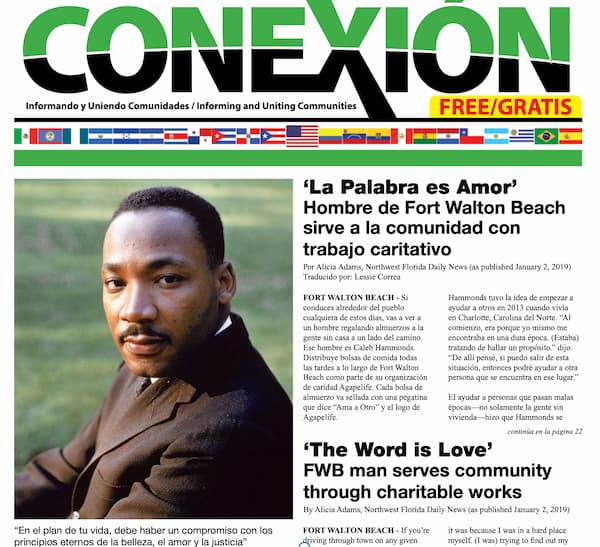 Portada de la edición de enero de 2019 de "Conexión", un periódico bilingüe español-inglés. El titular del artículo principal presenta a un hombre de Fort Walton Beach que sirve a la comunidad a través de obras de caridad. La página muestra banderas de varios países y el eslogan del periódico.