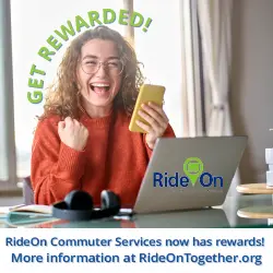 A joyful person with curly hair holds a phone and raises their fist in celebration. Text reads "Get Rewarded! RideOn Commuter Services now has rewards! More information at RideOnTogether.org." A logo features prominently.