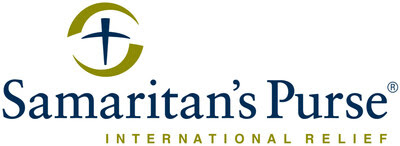 Samaritan’s Purse logo featuring a stylized cross inside a circular shape above the organization’s name, with “International Relief” written below in gold capital letters.