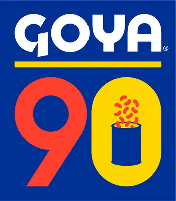 Goya logo above a large red “9” and yellow “0” with a can of beans inside the zero, celebrating Goya’s 90th anniversary on a blue background.