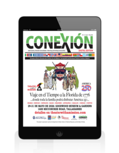 A digital tablet displays the May Digital Edition cover of "Conexión" magazine, featuring an event ad with colonial-era figures, American flags, and Spanish details for a historical reenactment in Tallahassee, Florida.
